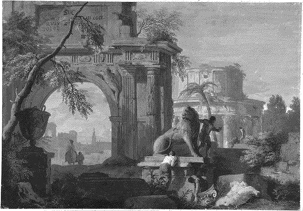 Classical ruins with standing columns by the water, rendered as 1-bit dither.